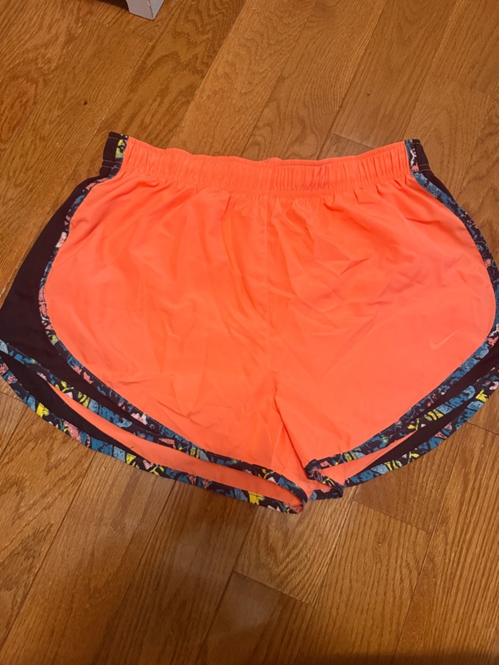 Nike Neon Coral Athletic Shorts with Patterned Trim